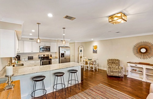 Historic Downtown Savannah Apartment | Inviting Garden Level Condo Near Forsyth Park by Lucky Savannah