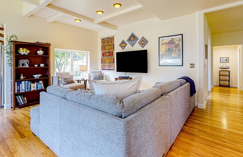Westhaven-Moonstone House | Inviting home with water view, enclosed yard, hot tub, firepit, & W/D