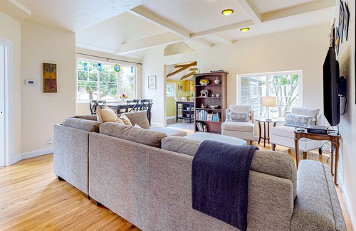 Westhaven-Moonstone House | Inviting home with water view, enclosed yard, hot tub, firepit, & W/D