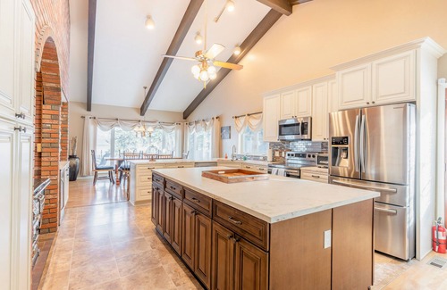 Lakeside House | Inviting lakefront homes w/hot tub, dock, Living Room, firepit, & washer/dryer