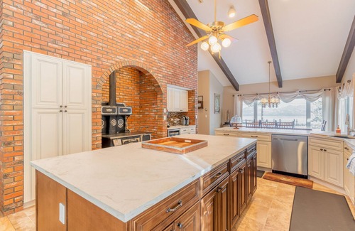 Lakeside House | Inviting lakefront homes w/hot tub, dock, Living Room, firepit, & washer/dryer