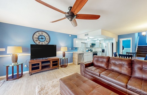 East End House | Inviting townhouse with on-site pool, updated interior, & W/D