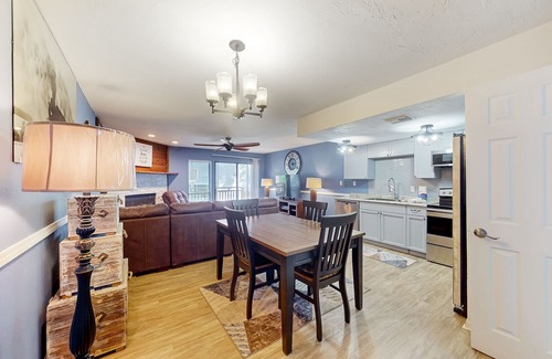 East End House | Inviting townhouse with on-site pool, updated interior, & W/D