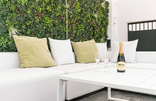 El Arenal Condo | ISG Apartments: Modern attic/pool at the Cathedral
