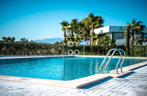 Alhama de Murcia Apartment | Isla de la Sierra - lake and mountain views - by OYOOSTAYS