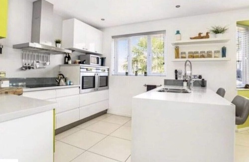 Poole House | Japanese Tree Cottage with Large Hot Tub