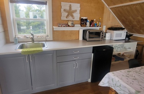 Cap aux Meules Apartment | Joli studio situé en plein coeur de l'île centrale, à quelques pas de la plage