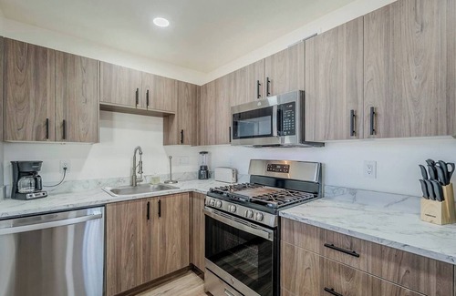 Tucson Apartment | Just down the street from the University of Arizona this 1 bedroom 1 bathroom is fully remodeled with your own dedicated electric vehicle charger .