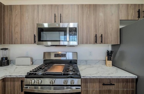 Tucson Apartment | Just down the street from the University of Arizona this 1 bedroom 1 bathroom is fully remodeled with your own dedicated electric vehicle charger .