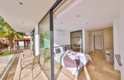 Kalkan Villa | Kalamar Bay. Luxury 6 bedroom villa with extra large 20m pool with swim trainer