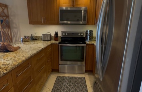 Kihei Condo | Kamaole Sands - Deep Lanai with Inner Courtyard and Ocean Views!