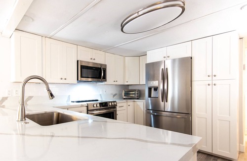 Sexton Cove Estates House | Key Largo updated Mobile Home 3/1.5 with 60 ft on canal with large tiki