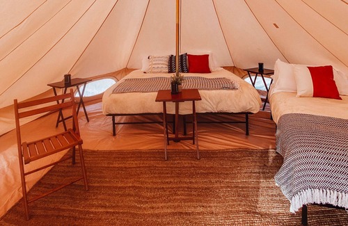 Island Park House | King Tent w/Shared Bathroom - Step into our open field between the mountains.