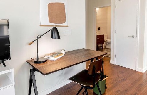Central Business District Apartment | Kislak 507 Stunning 2BR with Den Corner Apt Retreat Above the City