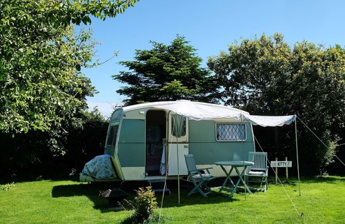 Grade Cabin | KItty unique 60s caravan set in pretty garden