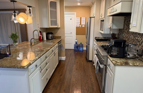 Huntington Beach House | Kone2HB Pad-Licensed Hawaiian-Style Retreat in HBnTropical Beach House Getaway.