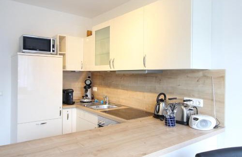 Juliusruh Apartment | Kurparkcarree - Ferienwohnung Meeresbrise