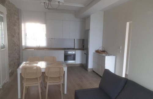 Fisterra Apartment | La Casa de Ana en Fisterra se Ubica en una Antigua Fábrica de Salazón de 1805