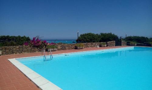 La Pelosa Apartment | La Finestra su Stintino 5 Appartamento con veranda vista mare e piscina