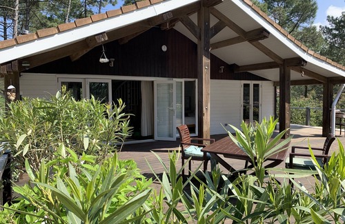 Le Porge House | La Jenny Chalet with views of communal pool in Naturist Village