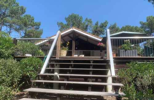 Le Porge House | La Jenny Chalet with views of communal pool in Naturist Village