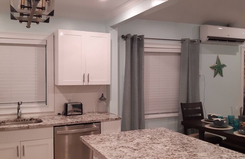 Treasure Cay Villa | La Nueva Beach home two minute walk to beach & 1 minute walk to the golf course