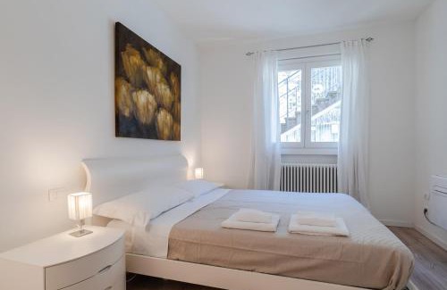Perledo Apartment | Lake Como views, bright cozy apartment