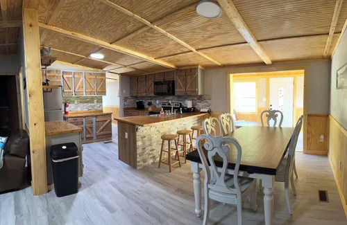 Big Creek House | Lake Front Property with a gentle path to a private dock and lake. 3bed 2 bath