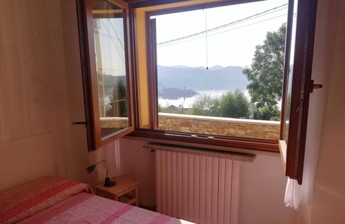 Pella Apartment | lake Orta Apartment with lake view, private courtyard and garden pets allowed