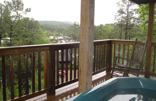 Mount Ida Cottage | Lake view three bedroom, three bath cottage with hot tub overlooking Lake Ouachita. by RedAwning
