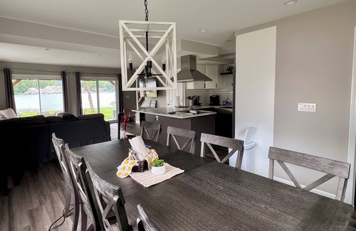 Lochmere House | Lakefront 3-bedroom Duplex on Lake Winnisquam, docks, Beach, WiFi, AC.nB2A
