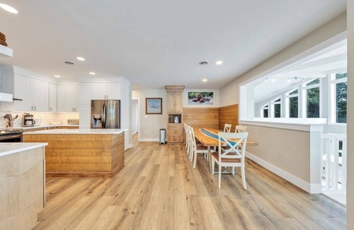 Moneta House | Lakefront 600 ft shore with beach & 28x28 ft deck, 4 King & 3 Twin beds for 11