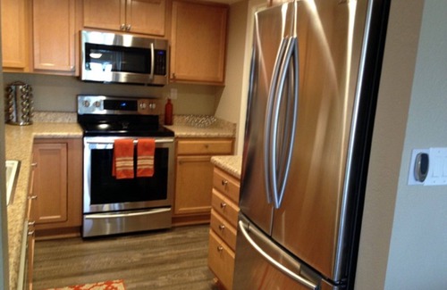 Desert Shores Condo | LAKEFRONT-BEAUTIFUL, PEACEFUL VIEWS-HEATED POOl & JACUZZI