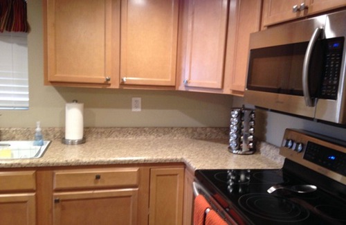 Desert Shores Condo | LAKEFRONT-BEAUTIFUL, PEACEFUL VIEWS-HEATED POOl & JACUZZI