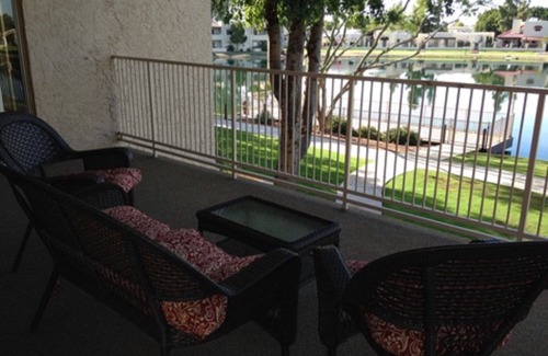 Desert Shores Condo | LAKEFRONT-BEAUTIFUL, PEACEFUL VIEWS-HEATED POOl & JACUZZI