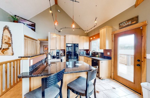 Lincoln City House | Lakefront, Family-Friendly Home w/a Private Hot Tub, Game Room, & Dock