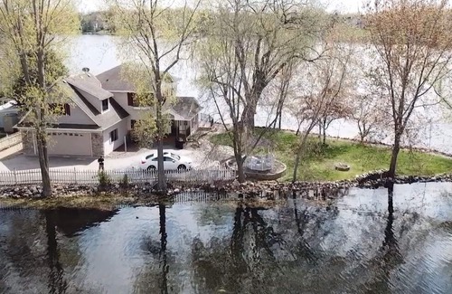 Lindstrom House | Lakefront Family Getaway! Pontoon Rentals-Kayak-Pedal Boat-Fire Pit-Sandy Beach