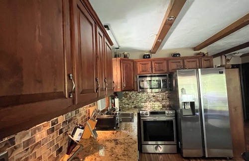 Briar Crest Woods House | Lakefront, Game Room, Canoe, Fire Pit, Pet Friendly, Fenced Yard, Buddha Garden