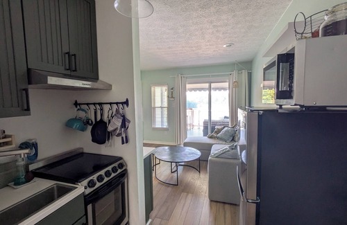 North Shore Condo | Lakefront Hideaway - Outdoor Balcony Perfect for Relaxing