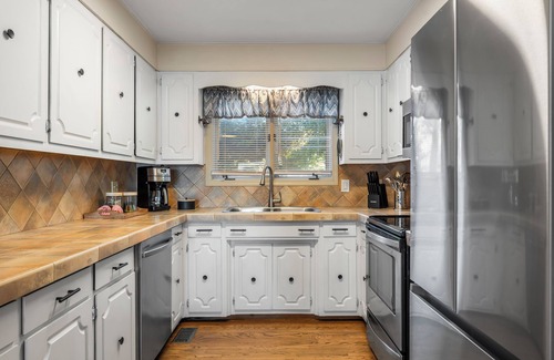 Mount Mourne House | Lakefront Home w/Dock, Game Room & Hot Tub | Ponderosa Peninsula by AvantStay