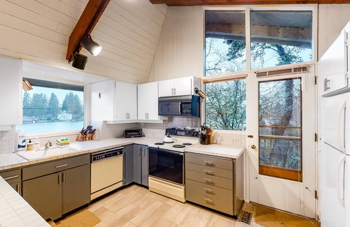 Otis House | Lakefront house w/private dock, firepit, and sunset views