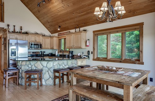 Eagle River House | Lakefront lodge with private dock, firepit, deck & sunset views