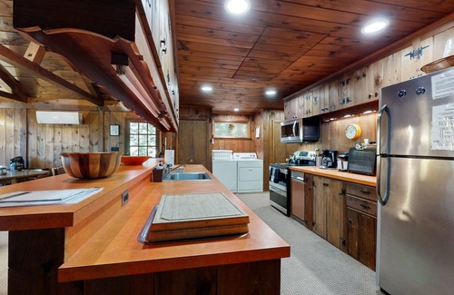 Wolfeboro House | Lakefront & ski retreat with wrap-around deck, wood fireplace, & private beach