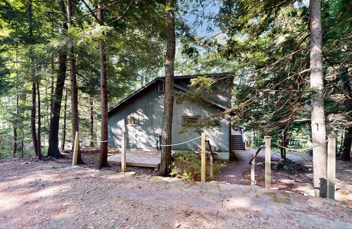 Wolfeboro House | Lakefront & ski retreat with wrap-around deck, wood fireplace, & private beach