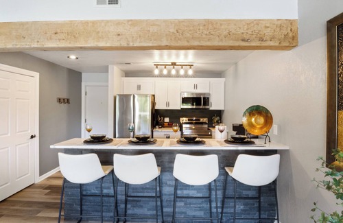 Osage Beach Condo | Lakefront Stargazer - Fireplace - Desk - King & Queen Beds - Stunning Views