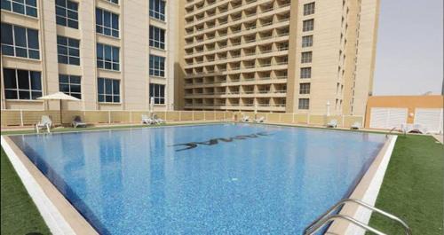 Dubai Production City Apartment | Lakeside D - Impz location