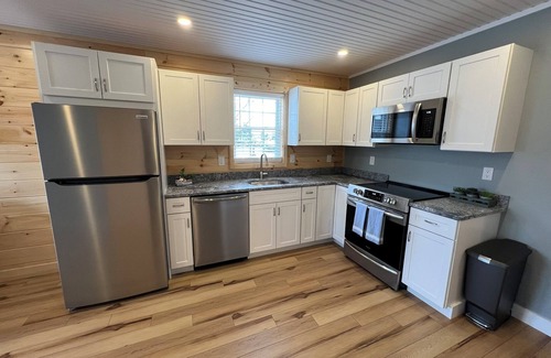 Laconia Condo | Lakeside Suite with Private Association Beach