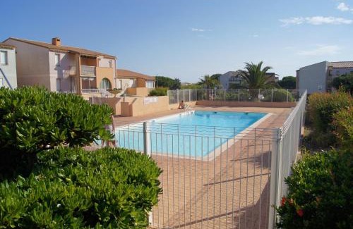 Cap d'Agde Apartment | Lara 2 - T2 Balcon Piscine lit double & clic-clac Parking Près du centre-port et île Loisirs