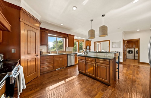 East Central House | Large luxury home! Views! Hot tub! Game room! EV charger! Pool table! Grill!