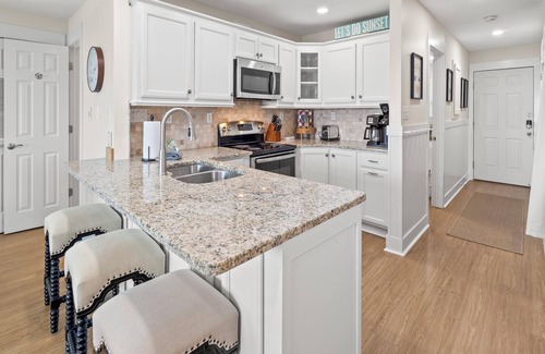 Fort Bay Condo | Latitude 29 Condominiums #18 | Gulf Front + Amenities